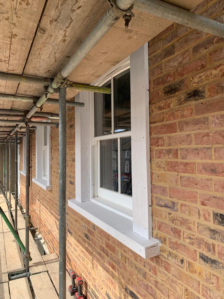 Window installation new brickwork elevation